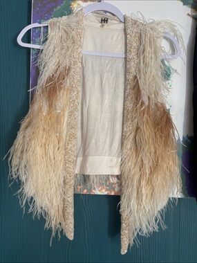 Haute Hippie Kate Open-Front Feather Vest, which originally retailed for $1,295